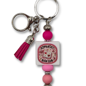 Breloczek zawieszka do torebki dla fanki romantasy w kolorze różowym z ozdobnym chwostem
