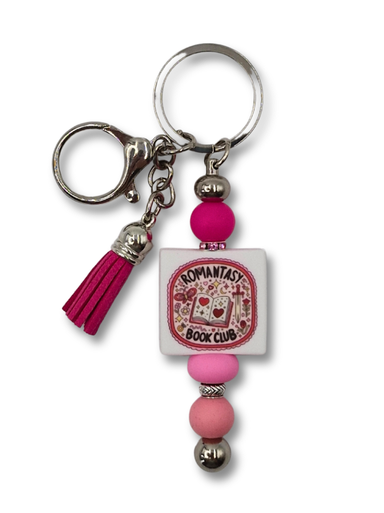 Breloczek zawieszka do torebki dla fanki romantasy w kolorze różowym z ozdobnym chwostem