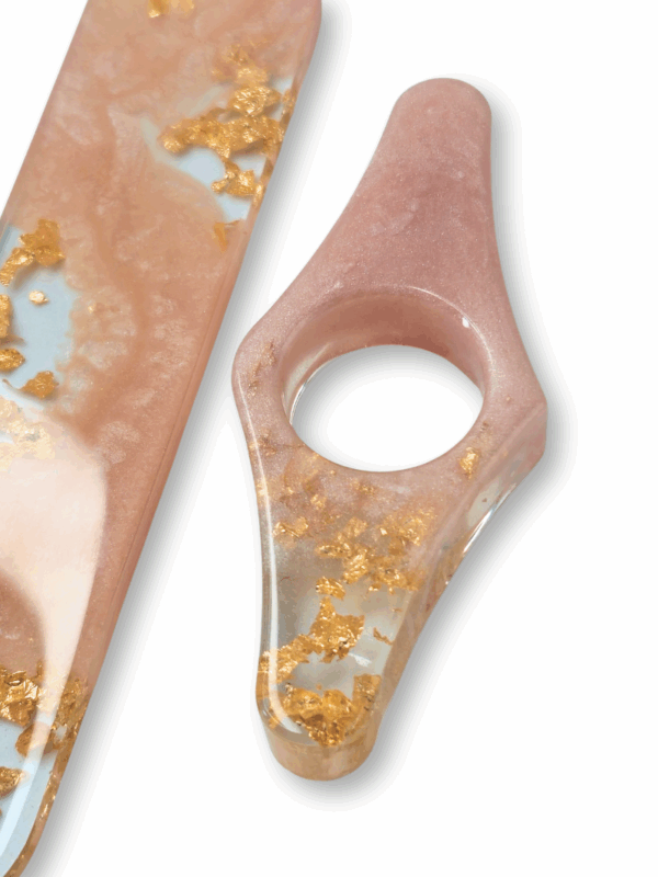 uchwyt do książki z żywicy z płatkami złota w kolorze różowym