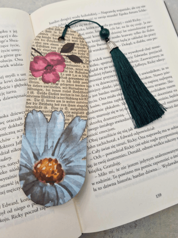 zakładka z ozdobnym chwostem starym drukiem i kwiatami