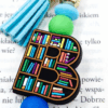 gadżet dla czytelników biblioteki breloczek kolorowy dla miłośników czytania