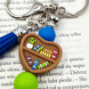 breloczek z sercem i książkami dla miłośników czytania booklovers