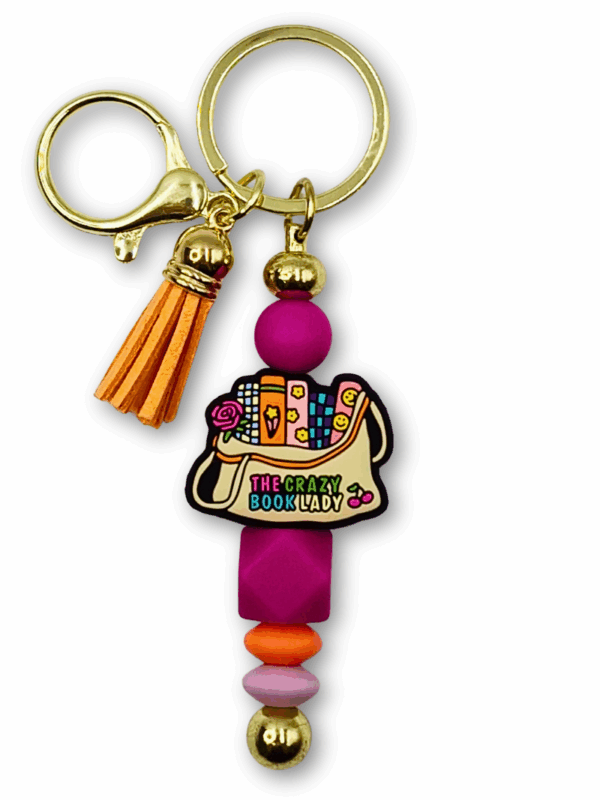 breloczek na prezent dla szalonej książkary miłośniczki czytania z napisem "The crazy book lady"