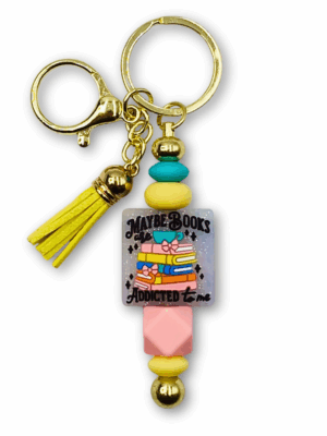 breloczek książkowy z zabawnym tekstem może to książki są uzależnione ode mnie na prezent dla książkary