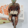 figurka ceramiczna handmade na prezent dla miłośnika czytania i książek. postać czytająca książkę