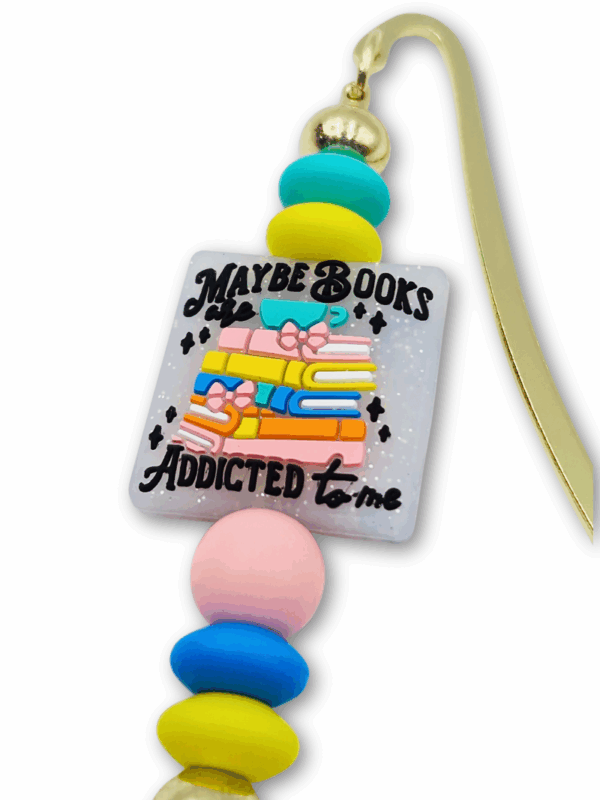 może to książki są uzależnione ode mnie - zakładka kolorowa metalowa z zabawnym hasłem dla książkoholiczki, miłośniczki książek i czytania