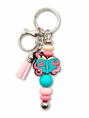 breloczek różowo-turkusowy ośmiornica książka we are booked