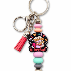 breloczek książkowy z motywem czytania prezent dla książkary dla miłośniczki książek