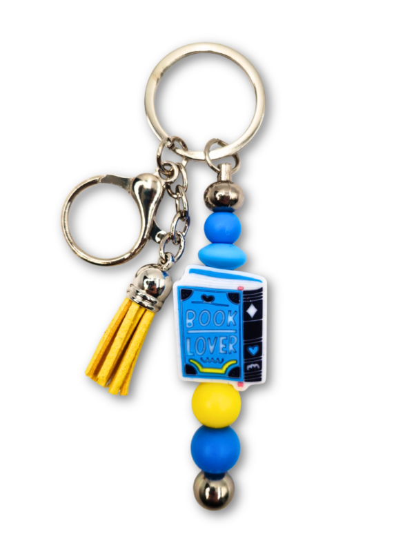 breloczek bag charm dla miłośnika czytania book lover w kolorze niebieskim i żółtym na prezent