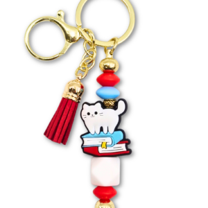 breloczek bag charm zawieszka do torebki lub plecaka z kotem i książkami prezent dla miłośniczki czytania