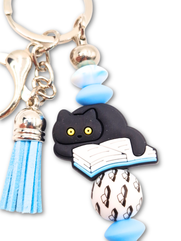 Breloczek bag charm Kot i Książki niebieski