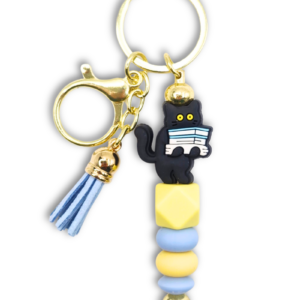 bag charm breloczek pastelowy zabawny z kotem i książkami na prezent dla kociary i książkary