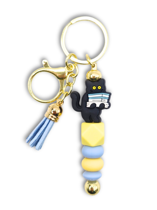bag charm breloczek pastelowy zabawny z kotem i książkami na prezent dla kociary i książkary