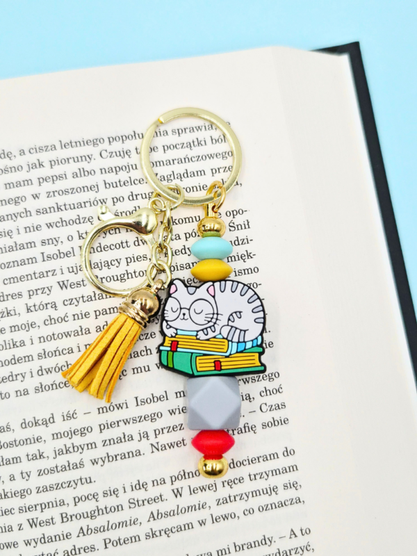 breloczek bag charm z kotem w okularach